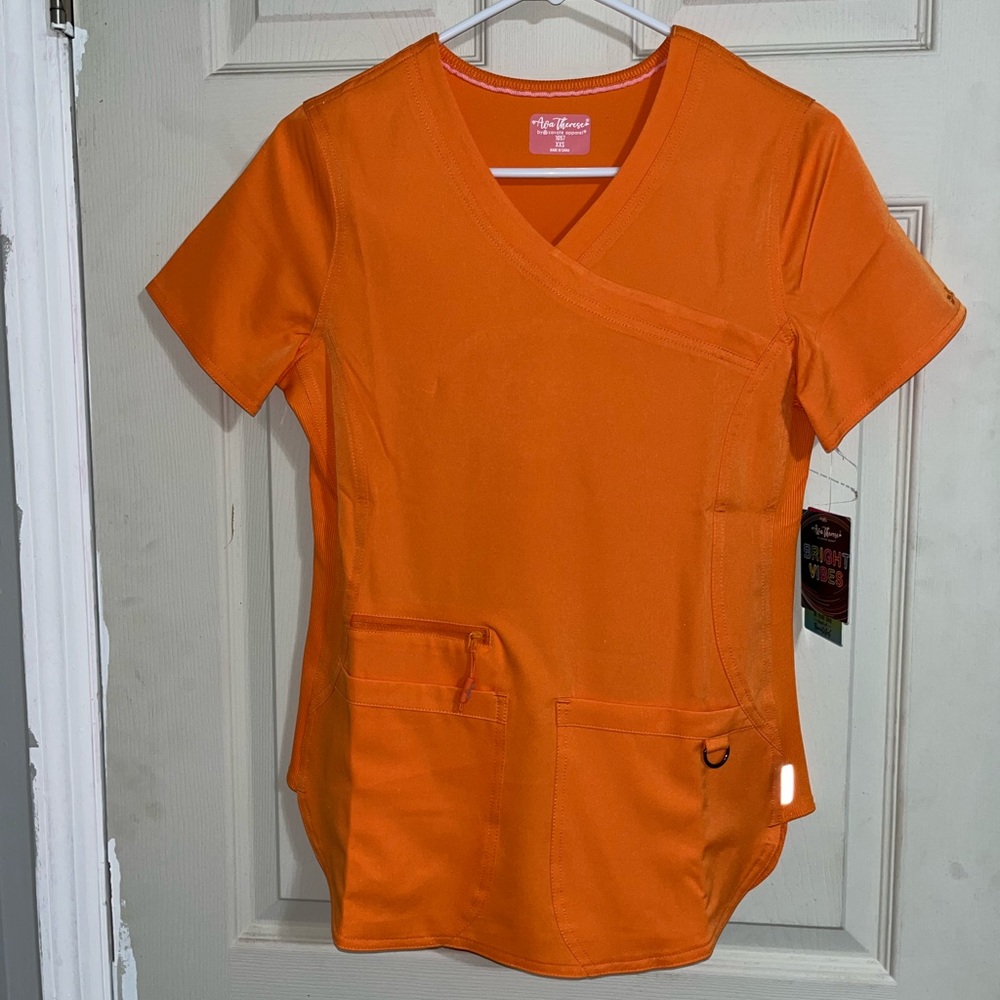 Orange scrub top
